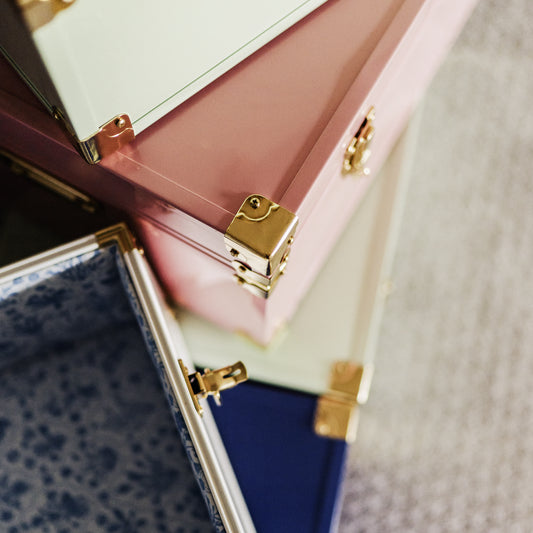 Close-up of several trunks stacked up.