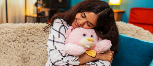 Girl adores her plush childhood pal.