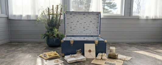 Open Momento Trunk with keepsakes arranged around it.