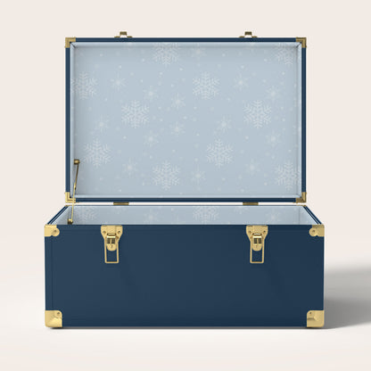 Navy trunk with a light blue snowflake interior pattern 