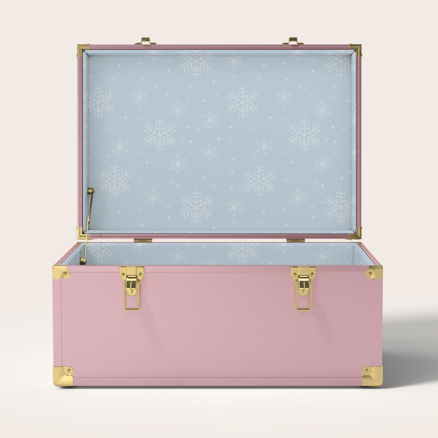 Pink storage trunk with light blue snowflake interior pattern