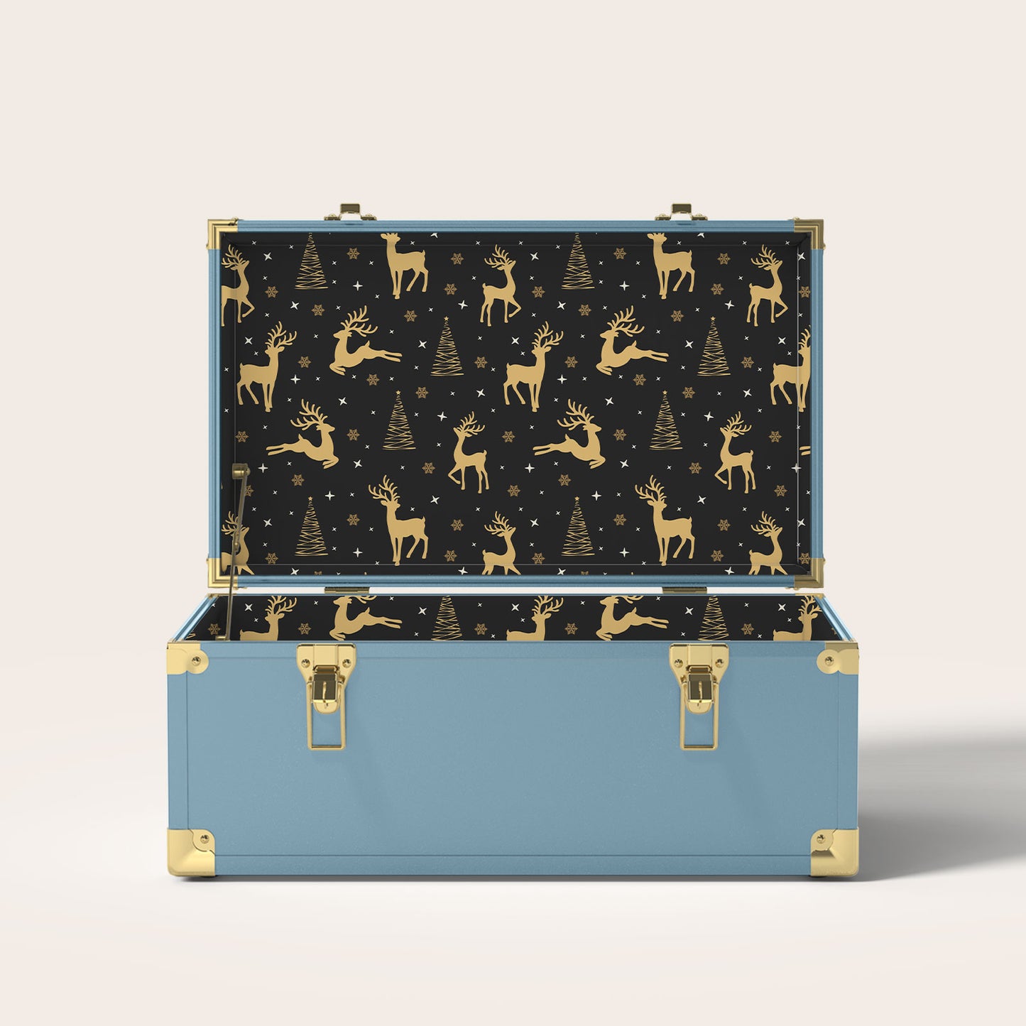 Blue storage trunk with gold reindeer and Christmas tree interior pattern