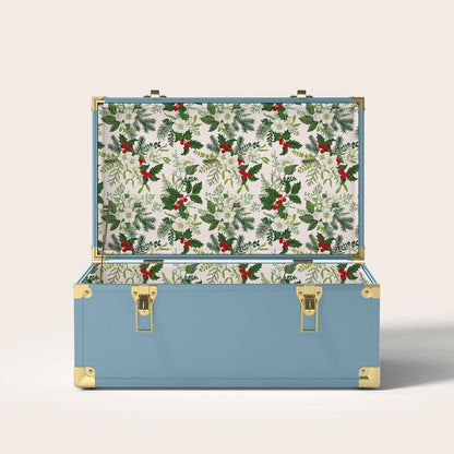 Blue trunk with Christmas holly interior pattern.