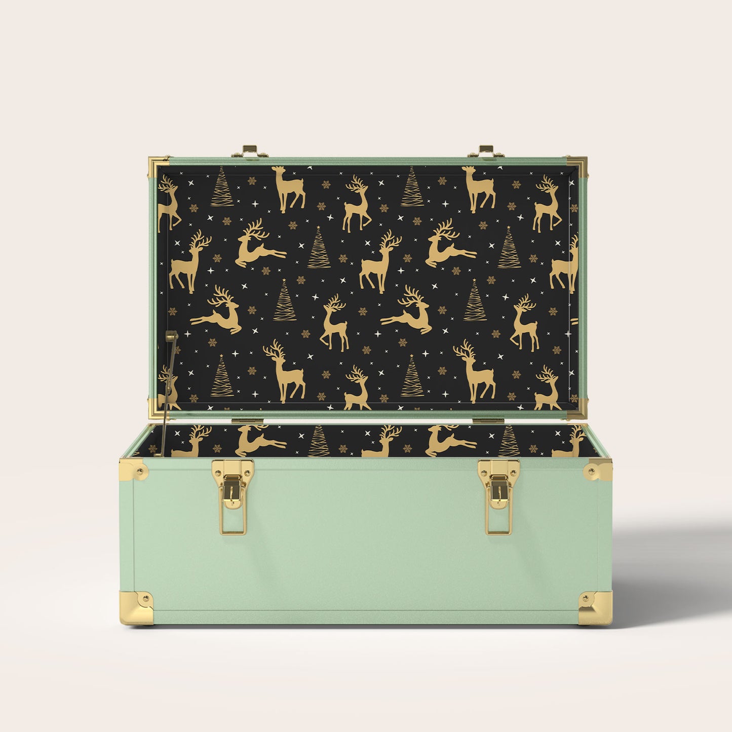 Green storage trunk with gold reindeer and Christmas tree interior pattern 