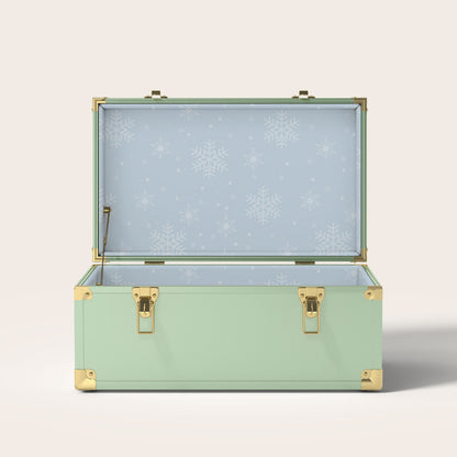 Green trunk with light blue snowflake interior pattern