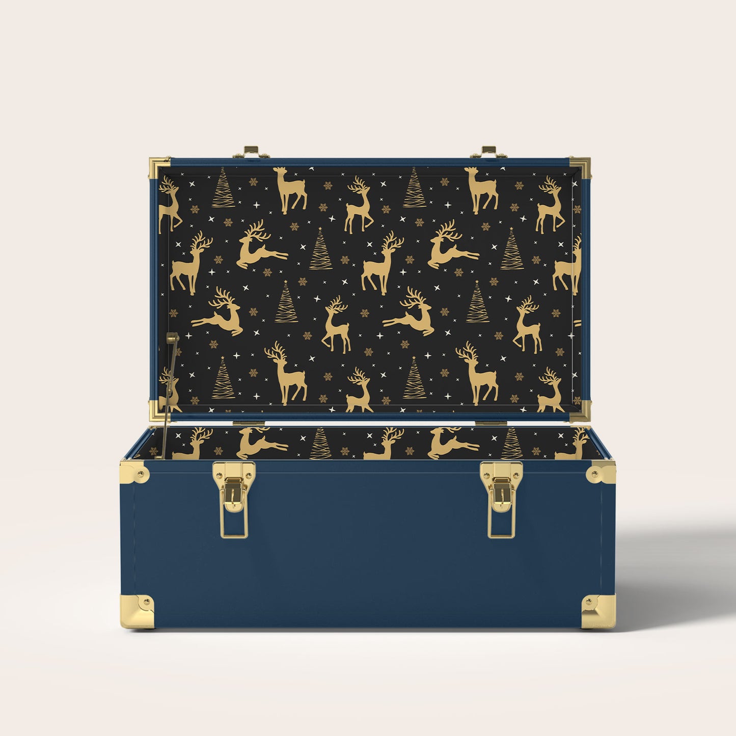 Navy storage trunk with gold reindeer and Christmas tree interior pattern