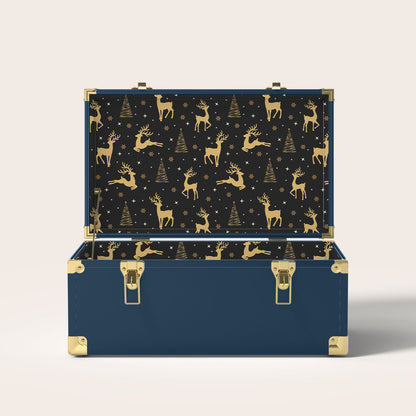 Navy storage trunk with gold reindeer and Christmas tree interior pattern