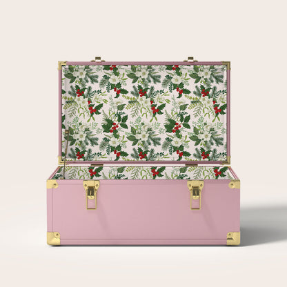 Pink trunk with Christmas holly interior pattern.