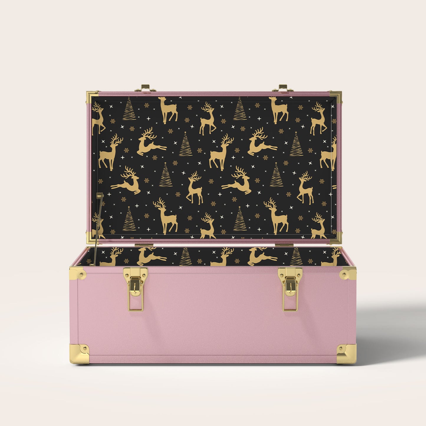 Pink storage trunk with gold reindeer and Christmas tree interior pattern 