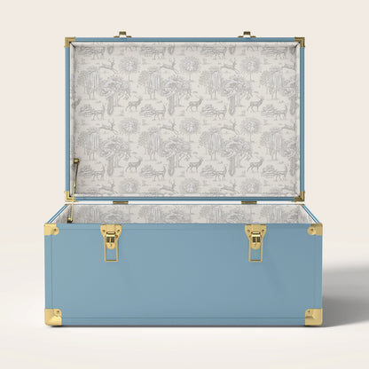 blue trunk with cream landscape interior pattern