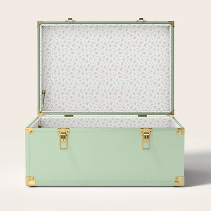 Green trunk with floral interior pattern