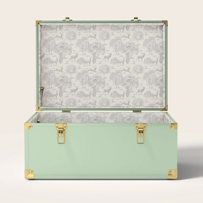 Green trunk with cream landscape interior pattern