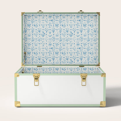 Green and white trunk with blue floral interior pattern