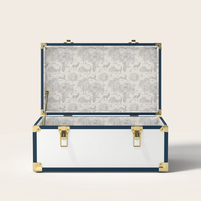 Navy and white trunk with cream landscape interior pattern